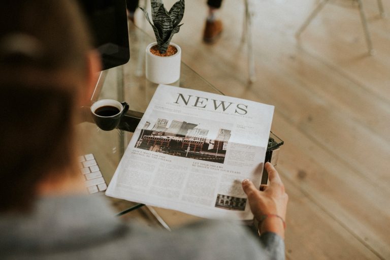 Businessman reading a newspaper